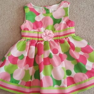 Green and pink polka-dot dress